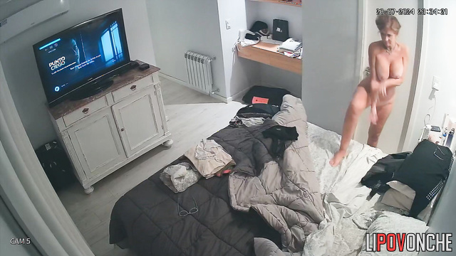 MILF with huge boobs changes clothes and dances