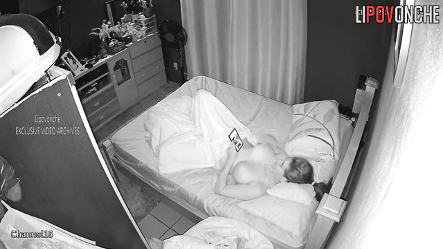 Passionate sex of a couple in the bedroom on the bed