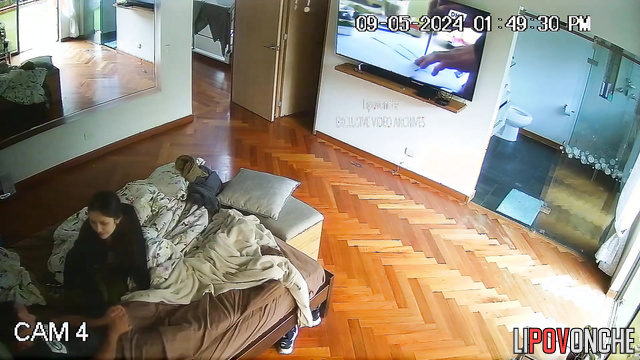 Shy brunette making handjob to her stepfather during tv watching