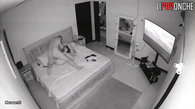 Couple with tattoos fucking in the bedroom on the bed