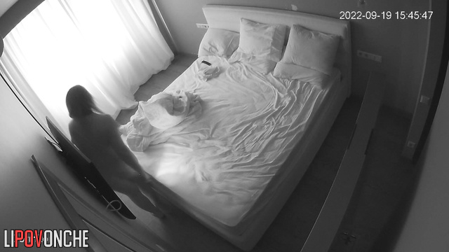 Hot fucking of a married couple on the bed in the bedroom
