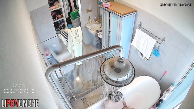 Fat milf sucking cock her husband in the bathroom