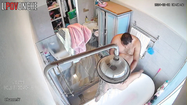 Fat milf sucking cock her husband in the bathroom