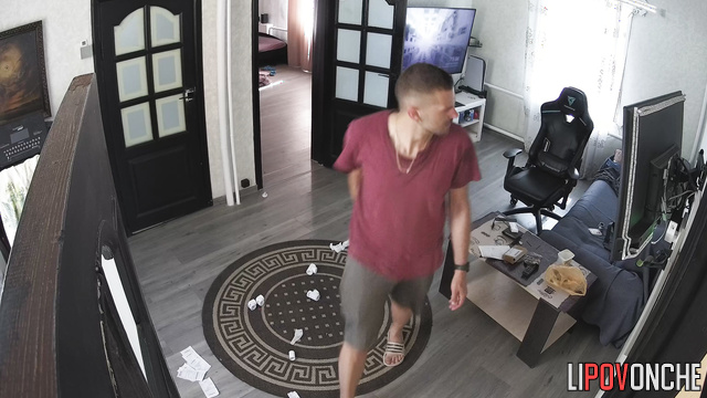 Man jerks off to his homemade porn in the living room