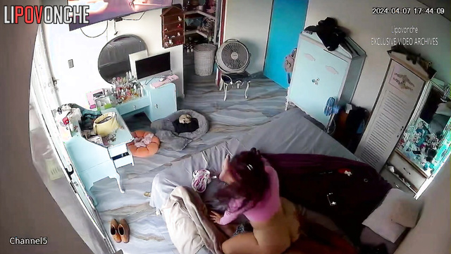 Curvy brunette rides her man's cock in front of the TV