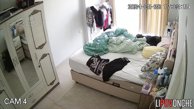 Muslim woman sucks her man's cock on the bed in the bedroom