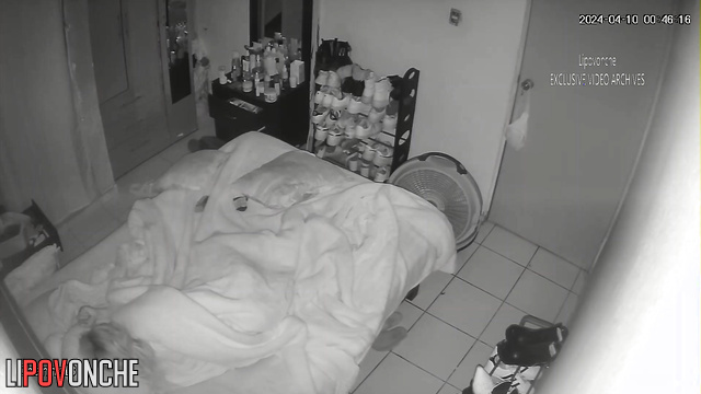 Sad blonde having fun with her fingers under the blanket