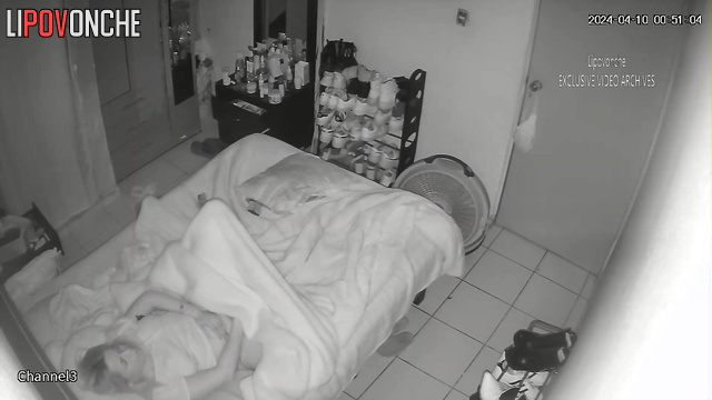 Sad blonde having fun with her fingers under the blanket
