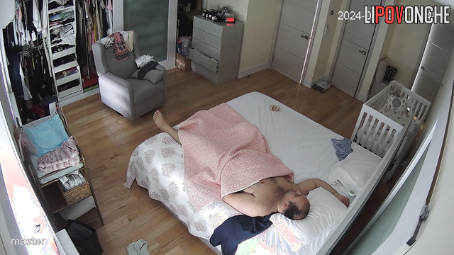 Husband and wife kissing so tenderly on the bed