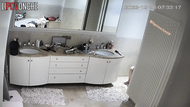 Naked milf dressing to swinger party (bathroom scene)