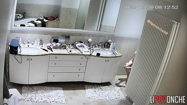 Naked milf dressing to swinger party (bathroom scene)