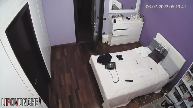Brunette takes a picture of her butt in the mirror