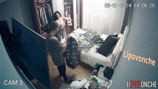 Busty brunette changes clothes in front of her man