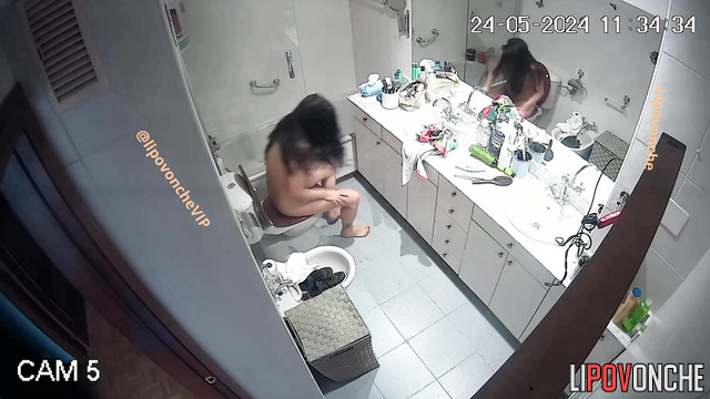 Girl took a shower and is now getting ready for work