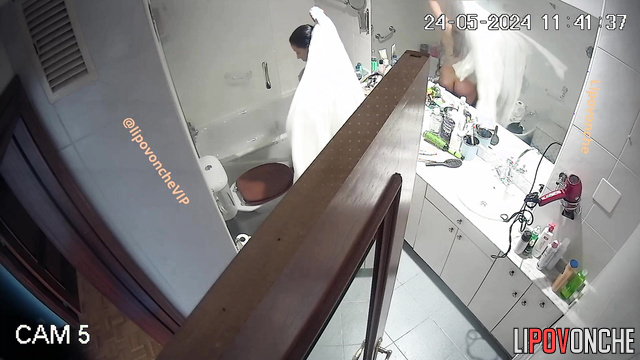 Girl took a shower and is now getting ready for work