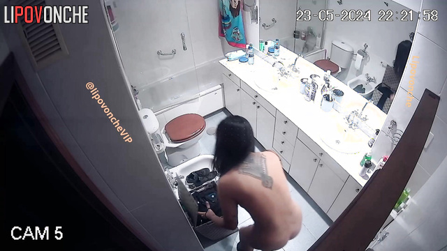Brunette with long hair is going to masturbate in the bath