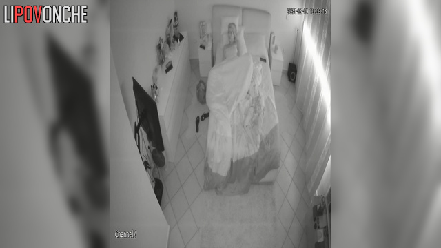 Single babe watching lesbian porn on TV (cam from bed)