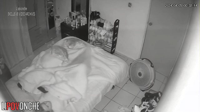 Babe having fun with her clit under sheets (night tape)