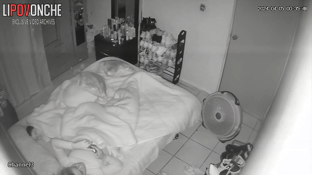 Babe having fun with her clit under sheets (night tape)