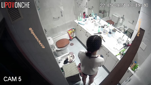 Cute and sexy schoolgirl putting pantyhose on
