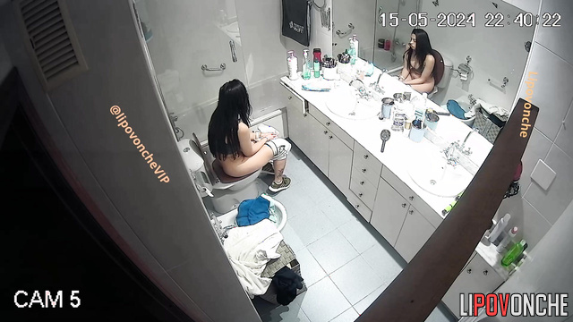 Hot Latina peeing in the bathroom (hidden tape)