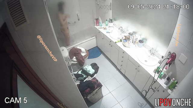 Cute brunette taking shower after dissolute party