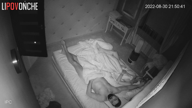 Bearded guy kissing sexy blonde in the bed