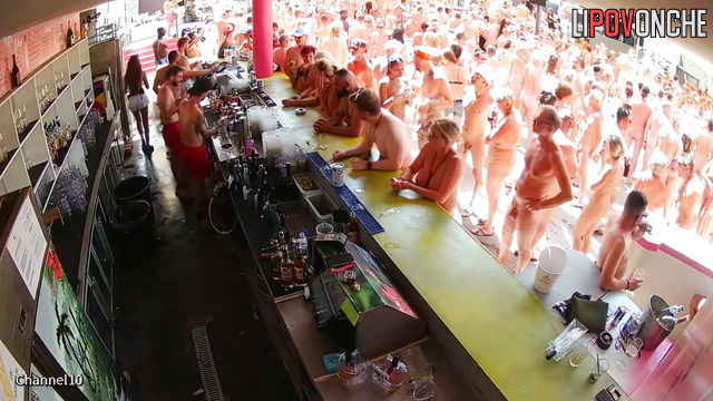 Swinger party with drinks, dancing and blowjobs near the bar