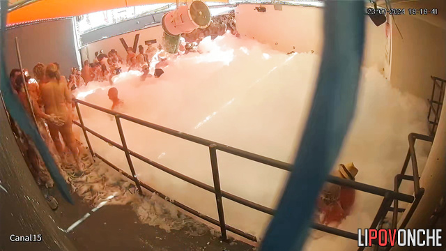 Naked people in foam want to fuck each other / video from club