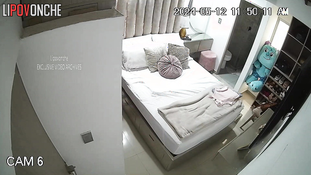 Tattooed brunette with big booty changes clothes in bedroom