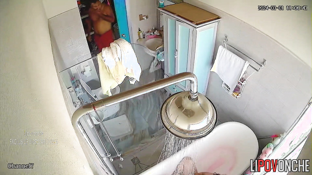 Fat brunette showering after peeing and masturbation