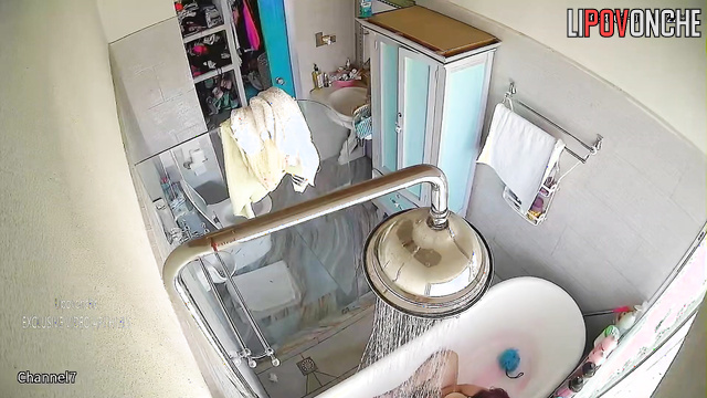 Fat brunette showering after peeing and masturbation