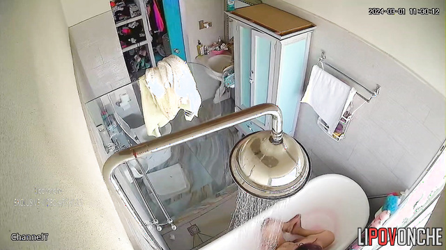 Fat brunette showering after peeing and masturbation