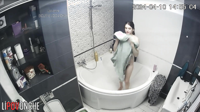Beauty brunette enjoying warm water after hard working day