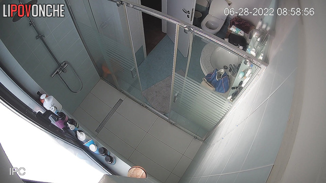 Tanned brunette with big tits took a shower in the bathroom