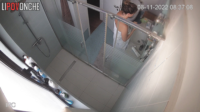 Blonde with small tits and shaved pussy showering right now