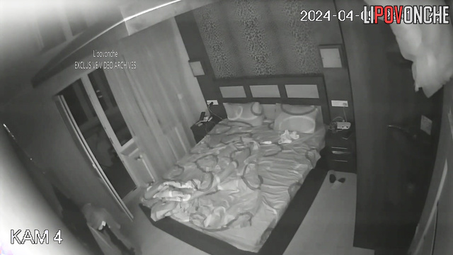 Brunette with long hair fucked a man in the bedroom on the bed