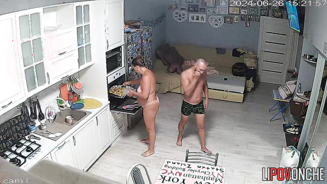 Naked milf preparing dinner with an oven (kitchen video)