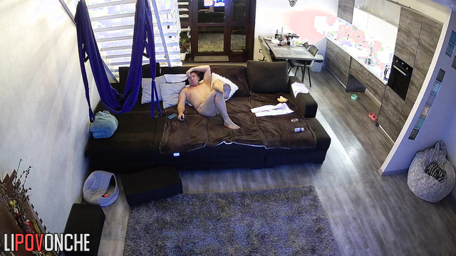 Naked man relaxing after awesome fuck in the living room