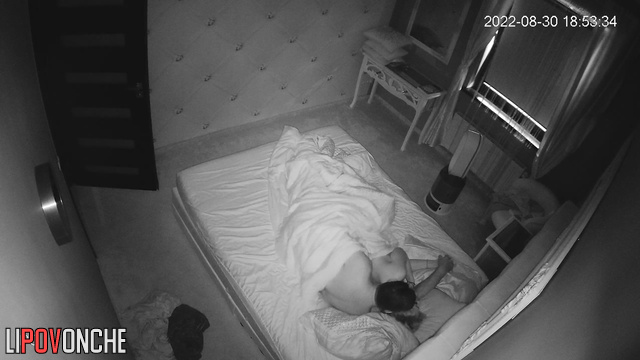 A loving couple enjoys each other and luxuriates in bed