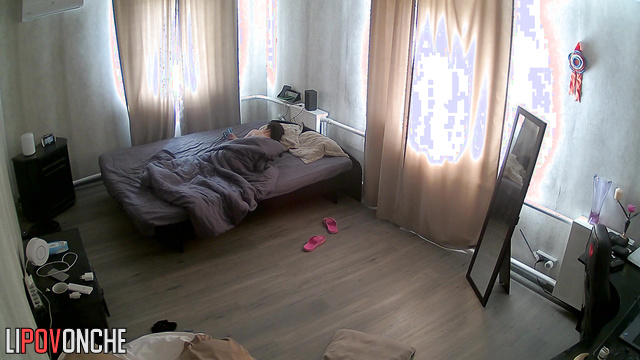 Naked girl dreaming of a good fuck lying on the bed