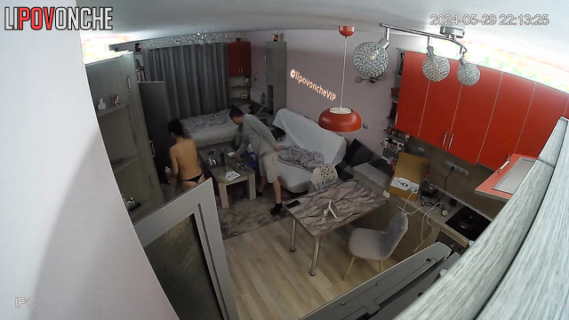 Topless brunette has no complexes (living room tape)