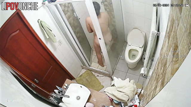 Brunette with gorgeous body peeing in the toilet