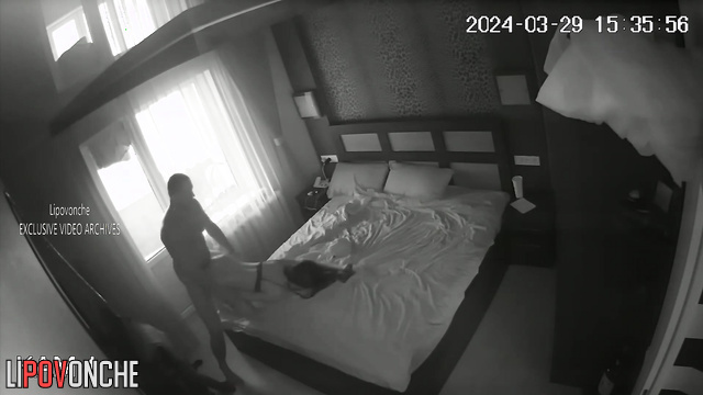 Man fucks skinny long haired brunette on bed in bedroom