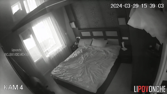 Man fucks skinny long haired brunette on bed in bedroom