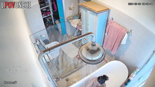 Chubby brunette taking shower and getting happy