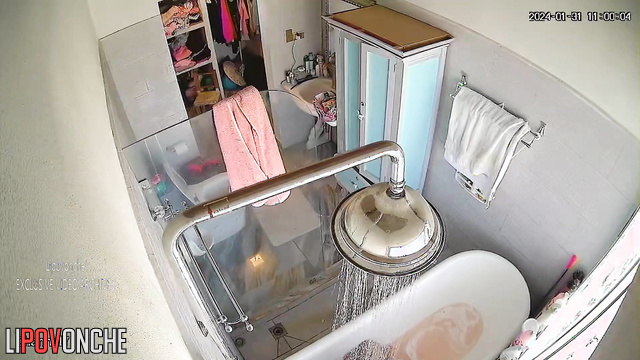 Beauty chabby lady showering hot in the batroom