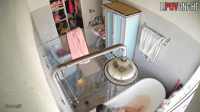 Beauty chabby lady showering hot in the batroom