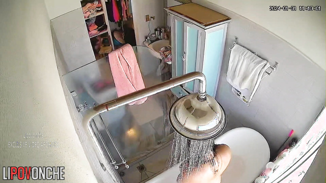 Beauty chabby lady showering hot in the batroom