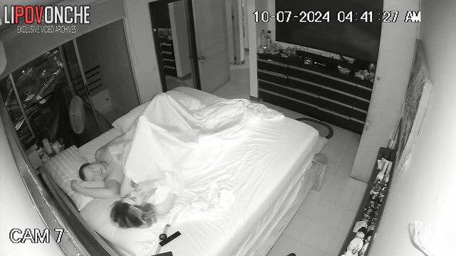 Tender kisses during missionary sex on the bed (cam in their room)
